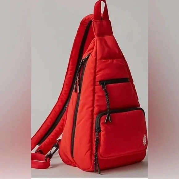 Free People Handbags - Free People Movement Cakewalk Sling NWOT Color Flame $78